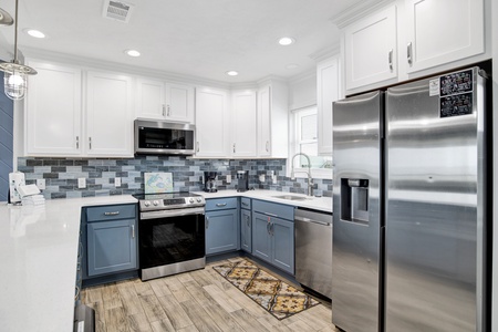 Stainless steel appliances and stone counters