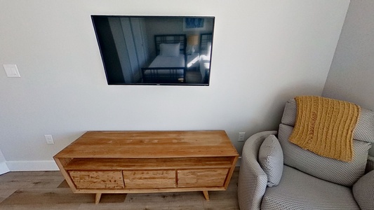 Bedroom 4 has a mounted television