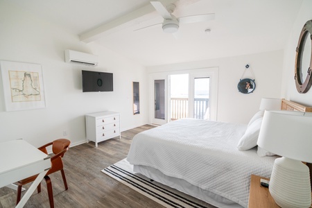 3rd floor Bedroom # 4 (A) has a king bed, TV, and Gulf views