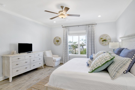 Bedroom 4 with a ceiling fan, TV and private bathroom