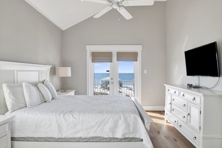 Bedroom #4  has balcony access, Gulf views, TV and a private bathroom