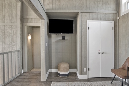 Bedroom 3 features a television