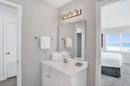 Shared bath with 2 vanities, tub/shower combo- entrance from the hall and Bedroom 5