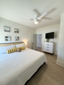 Bedroom 5 offers a TV and King bed, sleeps 2