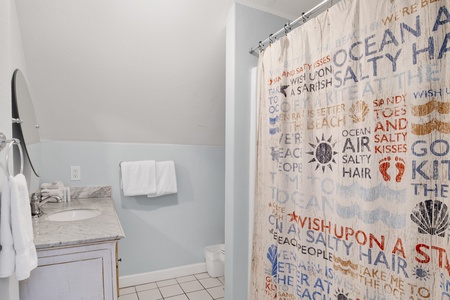 3rd floor shared bathroom with a tub/shower combo