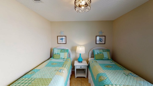 Bedroom #3 features 2 twin beds.