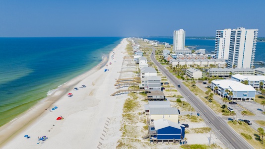 Birds eye view of West Beach Blvd, the Lagoon, and All Tide Up