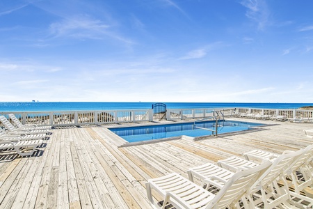Large pool deck with loungers