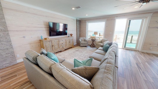 Living Area with large sectional and TV