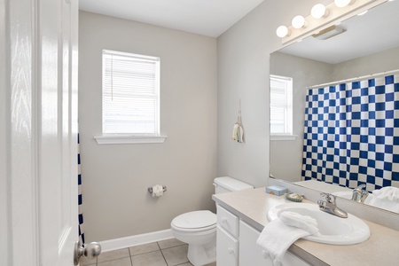 West-upstairs hall bathroom has a tub/shower combo