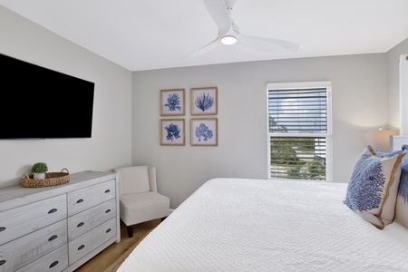 Bedroom 2 sleeps 2 guests and has a TV