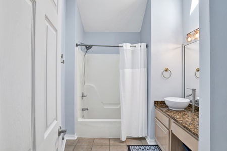 The master bath has a tub/shower combo