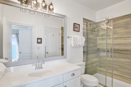 1st Floor Bathroom is attached to Bedroom 1 and has a hall entrance