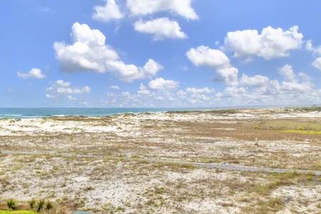 The balcony offers panoramic views of the Gulf and Little Lagoon