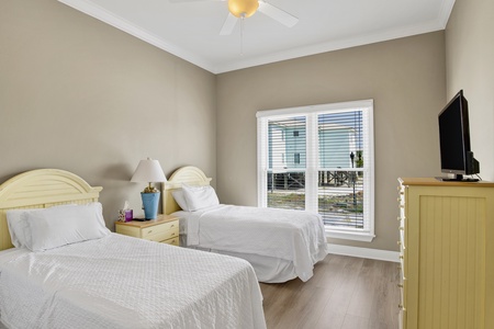 First floor bedroom, with 2 twin beds and TV
