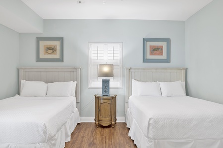 Guest bedroom 3 offers 2 Queen beds and a private bathroom