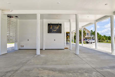 The carport offers parking for 4 vehicles with additional parking in the driveway