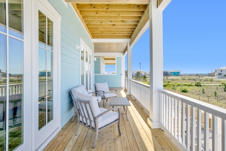 Covered outdoor seating on each side of the duplex