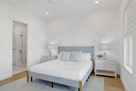 Guest bedroom 6 has a private bathroom and balcony access