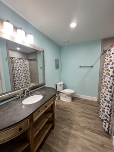 2nd floor guest bathroom with tub/shower combo