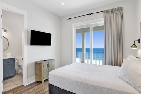 Bedroom #4 has balcony access, Gulf views and a TV