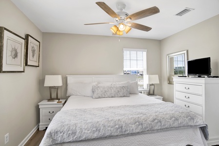 Bedroom 2 offers a King bed and TV