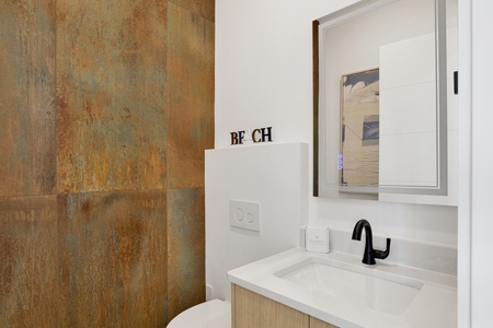 Half bathroom is located right off the 1st floor living area