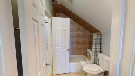 3rd floor Jack-n-Jill bathroom with a tub/shower combo