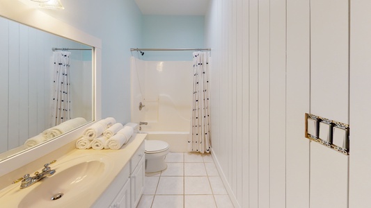 Bedroom 8 bathroom features a shower/tub combo