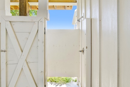 Private shower underneath house