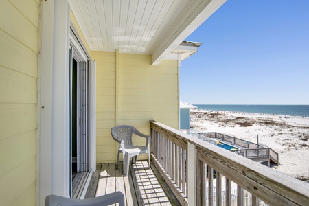 Private balcony with a view of the pool and Gulf