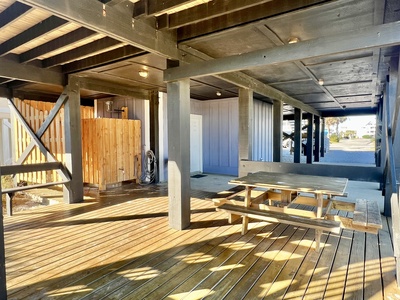 Covered picnic area under the home