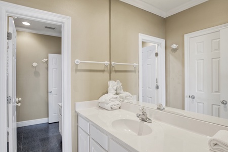 Jack and Jill style bathroom accessible from the hallway