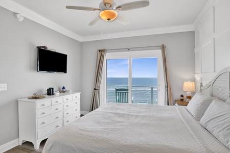 Bedroom 1 has balcony access, TV and an attached bathroom