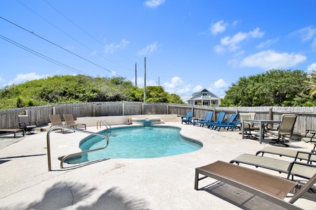 The pool is shared with the East side of the home