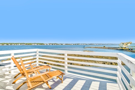 2nd floor open deck with lounge chairs