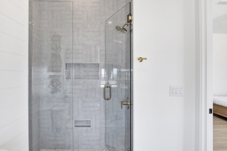 Featuring a walk-in tile shower