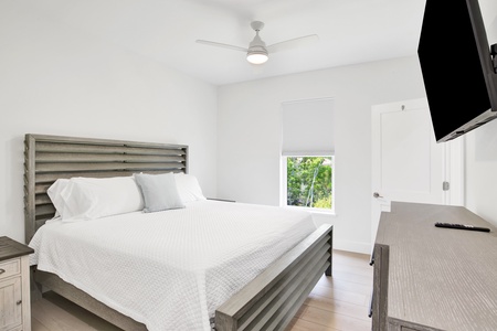 Bedroom 4 features a TV, ceiling fan and an attached Jack-n-Jill bathroom