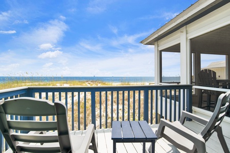 Balcony, accessible from the primary bedroom and screened porch