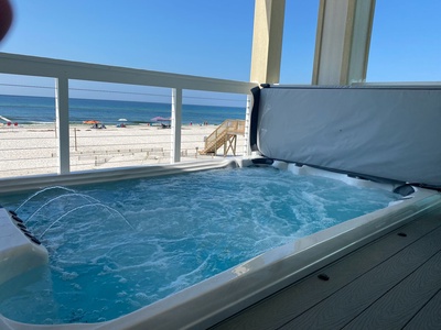 Private swim spa located on the deck on the main living level of the home