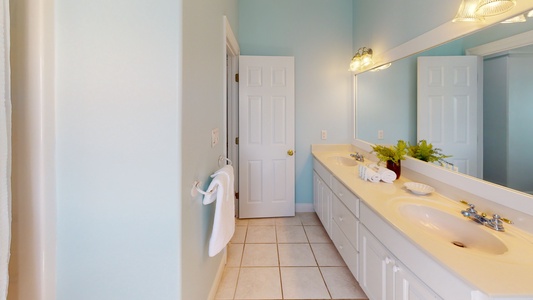 Bedroom 3 bathroom features large vanity with shower/tub combo