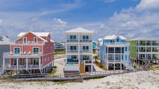 Boardwalk directly to the beach from the balcony steps!