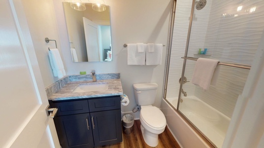 Private bathroom in Bedroom 3 with a tub/shower combo