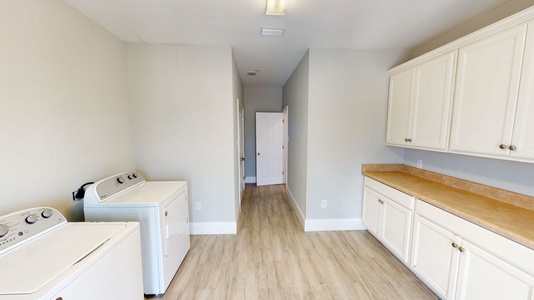 Large laundry room off of the kitchen