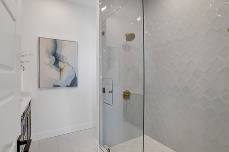Featuring a walk-in tile shower