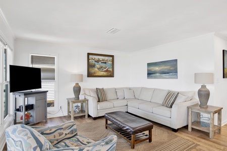 The living roof offers a sectional and TV