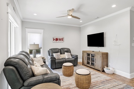 1st floor living area with a television