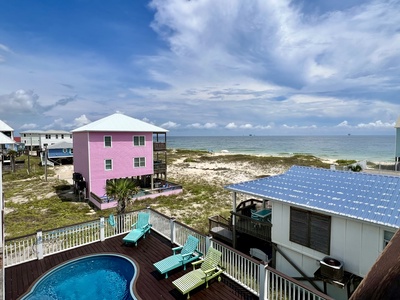 Expansive balconies on 2 levels that overlook the Gulf and private pool