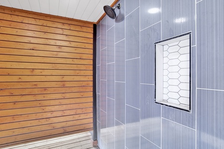 Private outdoor shower under the home