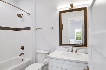 Summertime Blues II-The private bathroom for bedroom 2 has a tub/shower combo